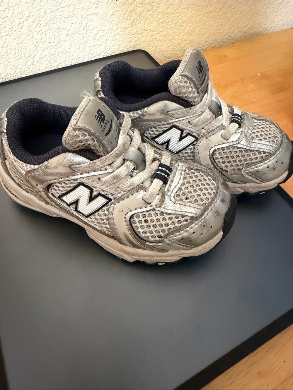 New Balance Kids Silver and Black Athletic Sneakers